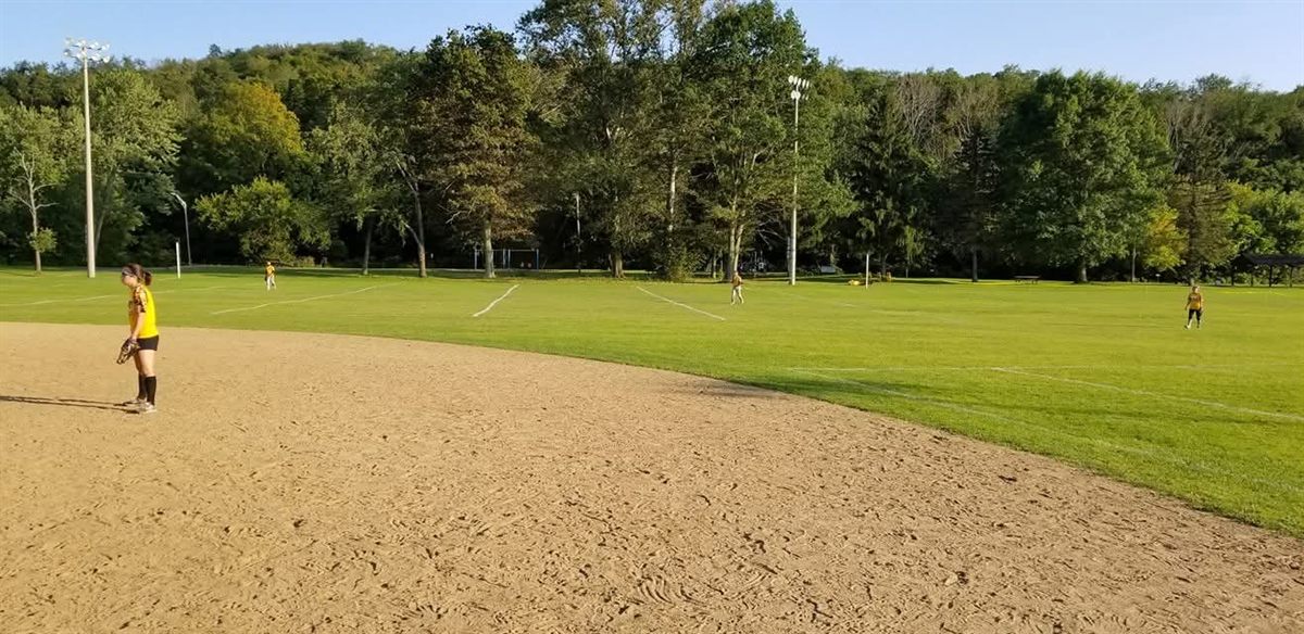 The outfield during a game at the sports complex